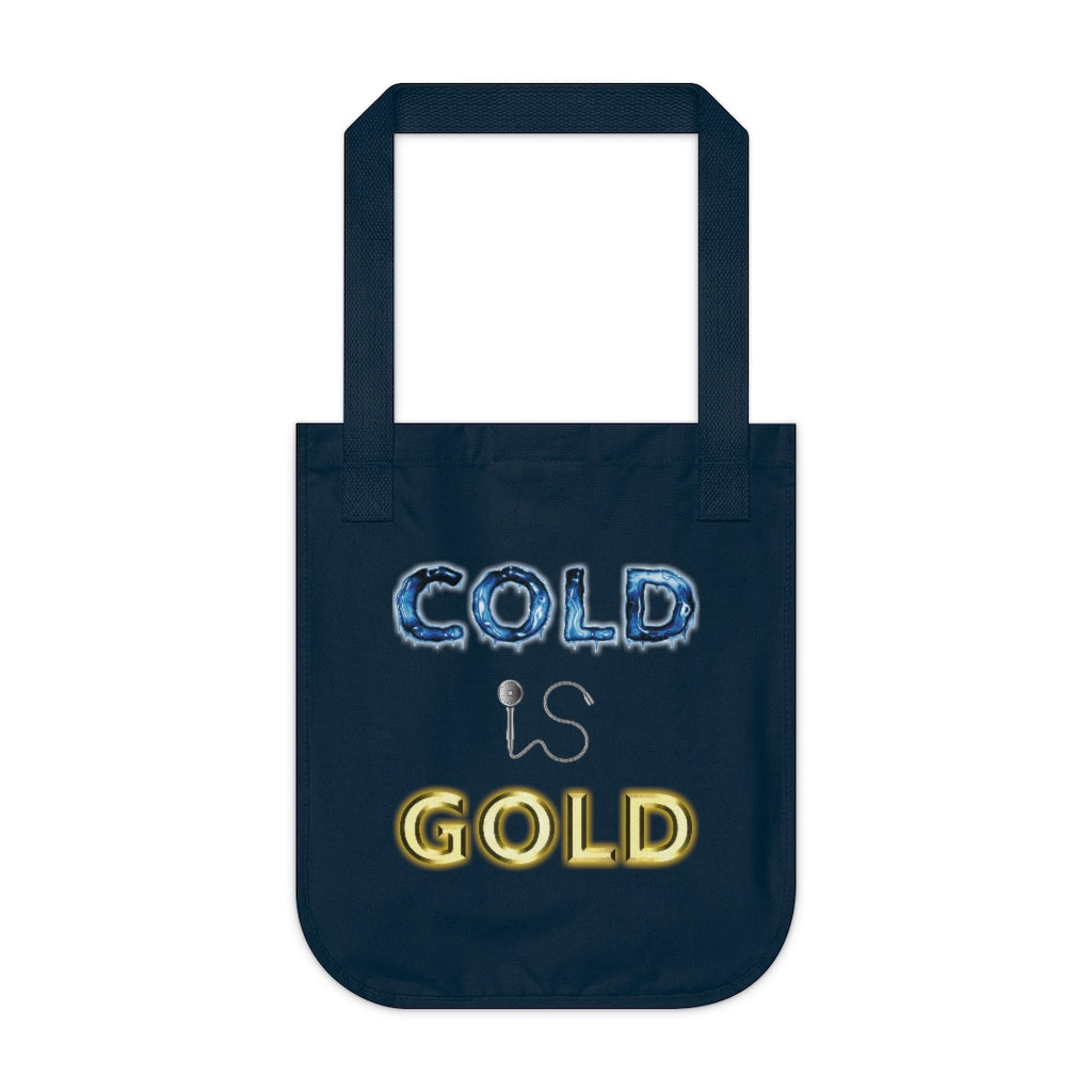 COLD IS GOLD - Navy Canvas Tote Bag with our classic golden and chilled design. The word cold is frozen stiff with icicles while the word gold is shiny and shaped like an ingot. The word Is is represented by a shower head and hose. Designed by Mark Buckwell for Sir Real Digital.